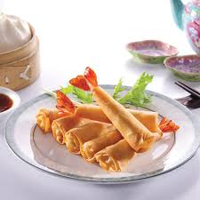 People struggle against the wind and rain in Malmö, Sweden, after a storm reached southern Sweden, Saturday Oct. 4, 2025. (Johan Nilsson/TT via AP)